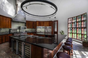 12 Chefs kitchen with triple-height ceiling